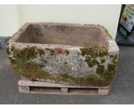A large carved natural stone trough (L122 x D80 x H50cm)