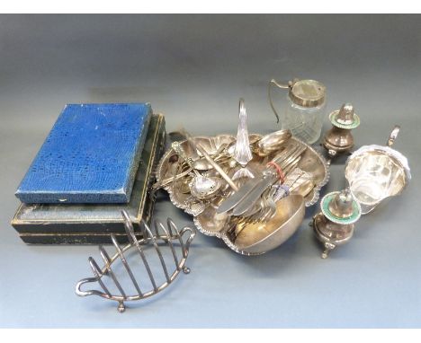 A collection of plated ware including a trefoil Walker &  Hall basket, toast rack, cutlery, Norwegian caddy spoon etc