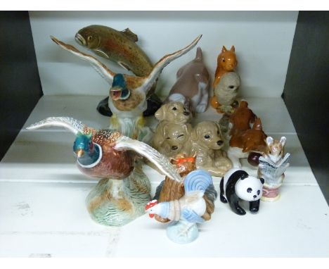 A collection of ceramics to include Beswick pheasant and duck figures, panda, novelty figures and Border Fine Arts owl and mo