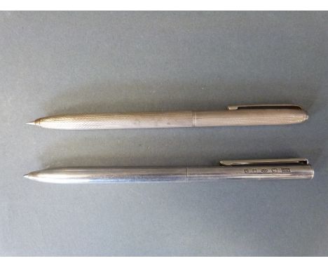 A feature hallmarked silver ballpoint pen, London 1963 maker Harrison Brothers and Howson Ltd and a hallmarked silver propell