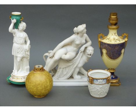 Royal Worcester vase stamped 1039, Coalport urn lamp, Parian figure of a naked lady riding a lion, a figure of a water carrie