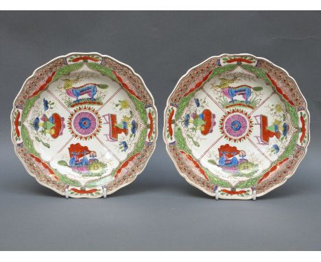 A pair of Worcester first period gadrooned plates hand decorated in the Dragons in Compartments pattern, 22.5cm diameter