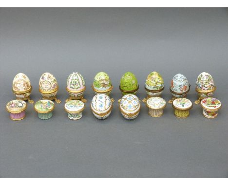 A quantity of Halcyon Days and other enamel pill boxes and eggs