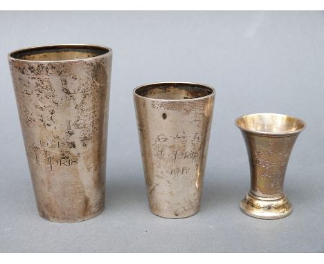 Three Swedish K Andersen white metal items comprising two beakers, larger height 8cm, both with Swedish silver marks for 1917