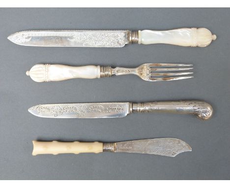 A Victorian hallmarked silver mother of pearl handled knife and fork, Sheffield 1894 and 1897, length of knife 25.5cm; an ivo