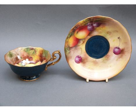 Royal Worcester painted fruit cup and saucer with speckled teal ground, the cup signed Moseley and the saucer Ayrton, both wi