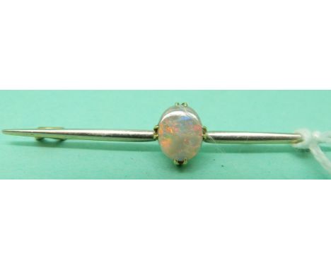 A 15ct gold brooch set with an opal cabochon