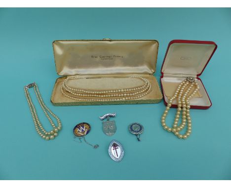 A cultured pearl necklace, two faux pearl necklaces and nurses' badges