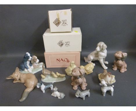 A collection of Nao bird, dog and fox figures, some boxed