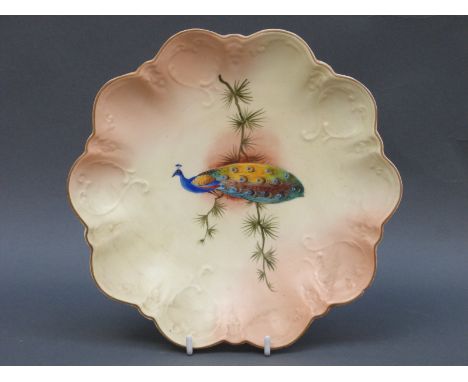 Locke & Co Worcester blush ivory cabinet plate decorated with a peacock signed H Wall, diameter 24cm