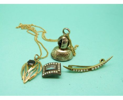 A 9ct gold necklace, a 9ct gold pendant set with a garnet, a Victorian seal, and two seed pearl brooches