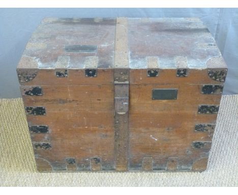 A 19thC metal bound pine silver chest/trunk with velvet lined multisection lift out trays with named compartments for silver 