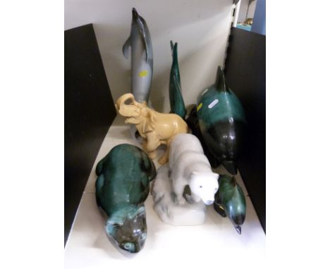 A collection of ceramic animals including Blue Mountain and Dux