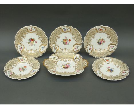 Five Chamberlains Worcester hand painted plates with floral and gilt decoration, with a similar serving dish