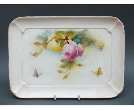 Royal Worcester porcelain tray decorated with roses, signed Hunt, puce mark to base, length 27cm