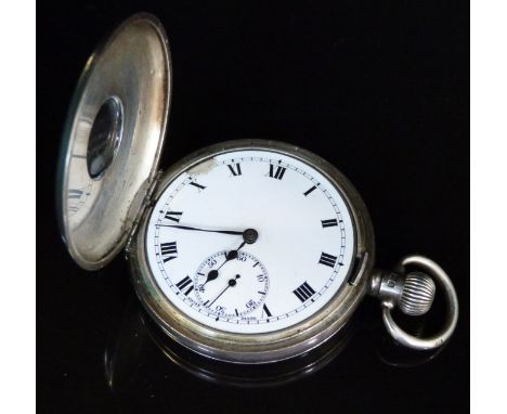 Hallmarked silver half hunter pocket watch with with subsidiary seconds dial, Roman numerals and black hands to the white ena