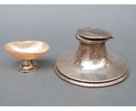 A hallmarked silver capstan inkwell, diameter 11cm, and a hallmarked silver mother-of-pearl dish