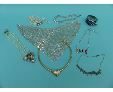 A collection of costume jewellery including an enamel and silver diamante necklace