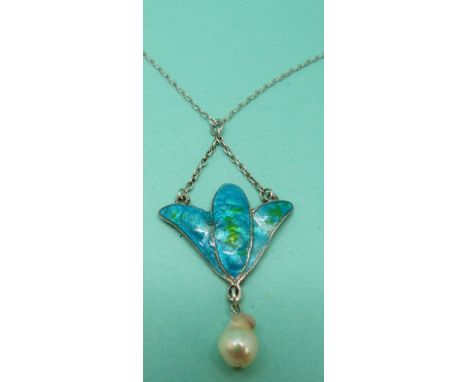 An Arts & Crafts silver necklace set with blue and green enamel and a drop pearl in Liberty style