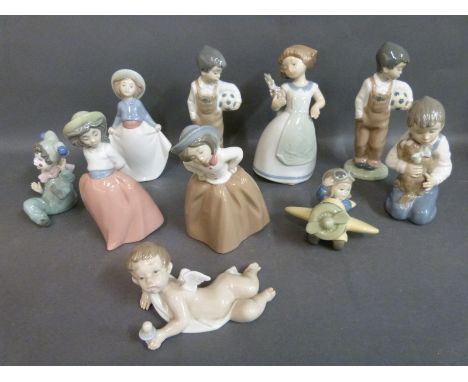 A collection of boxed Nao child figures