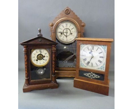 Three American mantel clocks to include a two train example with alarm feature, a similar example striking on a gong and anot