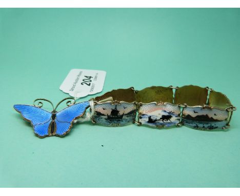 A Norwegian silver and enamel butterfly brooch by David Andersen and a Norwegian silver bracelet set with enamel panels 