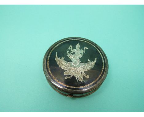 A silver Siam compact in original box