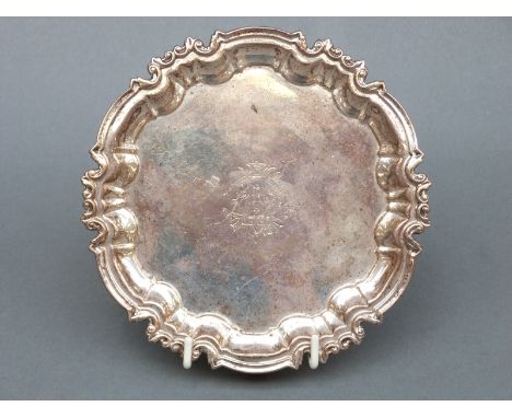 Edward VII hallmarked silver card tray with ornate border and three shell feet, Sheffield 1901, maker William Hutton and Sons
