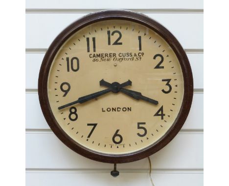 A bakelite cased Camerer Cuss & Co, 56 New Oxford St., London wall clock with electric movement, diameter 37cm 