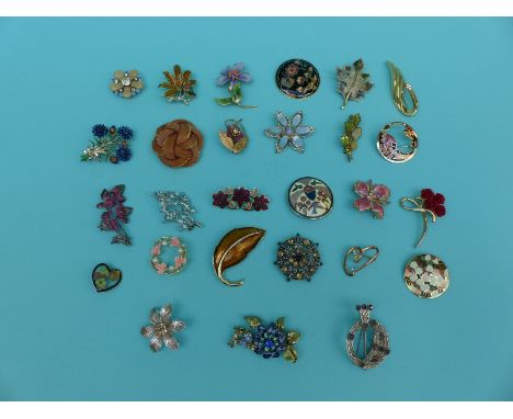 A collection of floral brooches some gem set, enamel etc including exquisite and fish
