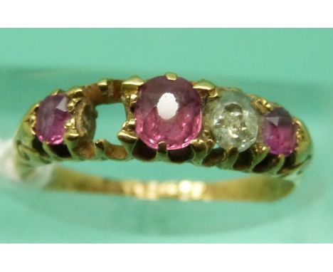 A late Victorian 18ct gold ring set with rubies and diamonds (size J/K), weight 2.04g