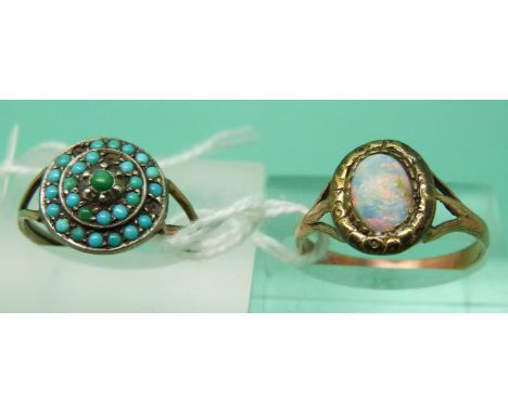 A Victorian ring set with an oval opal cabochon and a Victorian ring set with turquoise cabochons