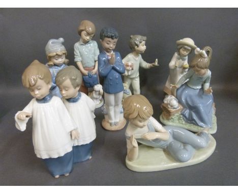 A collection of Nao child figures 