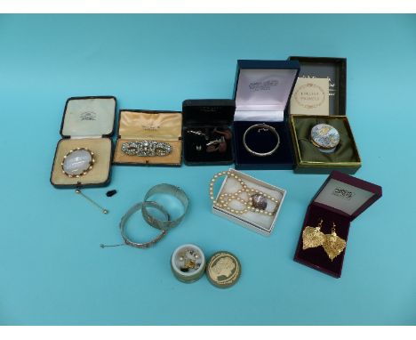 Two hallmarked silver bangles, a Victorian brooch, an enamel pot, silver gilt earrings, paste brooch, cufflinks, faux pearl n