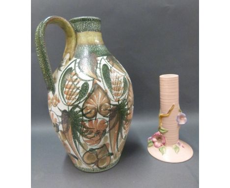 A large Denby jug and Clarice Cliff candlestick