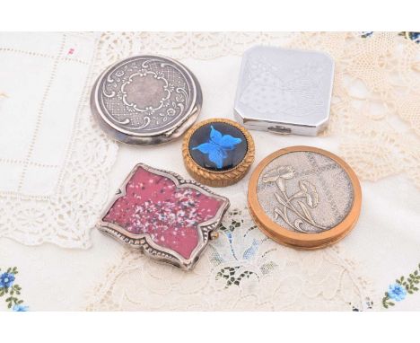 Four 1930s and later Russian compacts, comprising a circular Art Nouveau repousse floral decorated circular 6cm diameter, squ