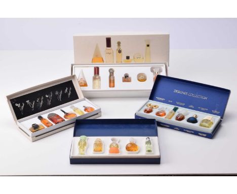 Four card rectangular boxes of miniature collections of lady's fragrances, comprising Designer Collection: Scherrer, Valentin
