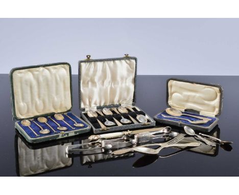 A small collection of silver and other flat ware, including a pair of silver fruit spoons, a set of six silver coffee spoons 