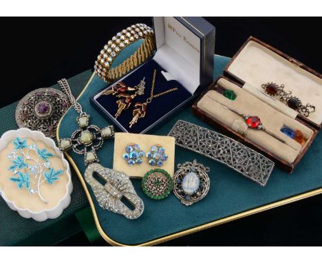 An art deco silver bar brooch, with five interchangeable paste set gems, boxed, pin now af, together with a good quantity of 