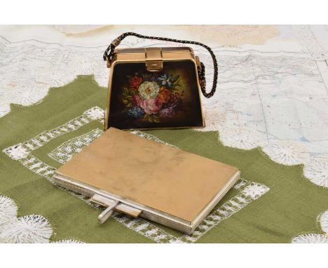 Two vintage bags, a rectangular unmarked heavy metal carryall having multiple fitted and covered internal compartments, brush