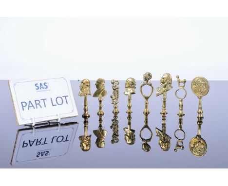 A collection of brass pipe tampers, approx 28, most figural or with bust of historical figures, two booted leg examples and m