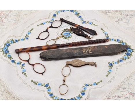 Vintage spectacles, including a pair of long handled lorgnettes encased in Hazebrouck 23 M de la Paix Paris, 27cm folded, tor