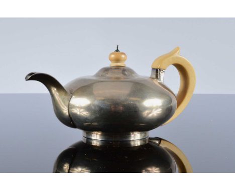 A George III silver tea pot by WB, 10.39 ozt, 18cm wide, London 1818, handle and finial possibly replaced and repair to insid