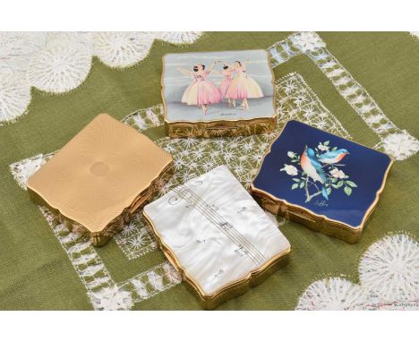 Four 1960s Stratton 'Musica' compacts, Four 1960s Stratton 'Musica' compacts, all with mirror to inner lid and covered compar