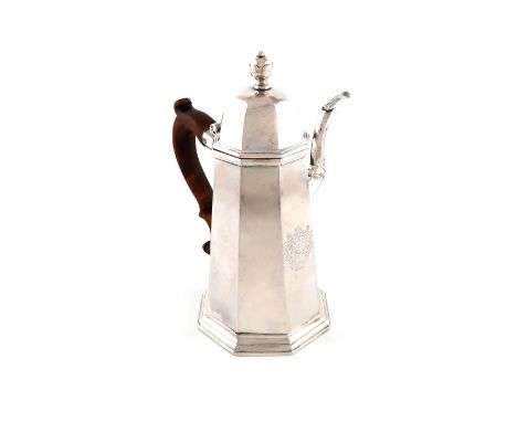 A George I silver coffee pot, by John Chartier, London 1716, tapering octagonal form, faceted spout, wooden scroll side handl