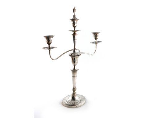 An Edwardian silver three-light candelabrum, by the Goldsmiths and Silversmiths Company, London 1906, tapering fluted oval fo