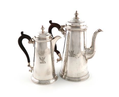 An Edwardian silver coffee pot and a similar hot water pot, by D and J  Wellby, London 1904, the water pot by Martin, Hall an