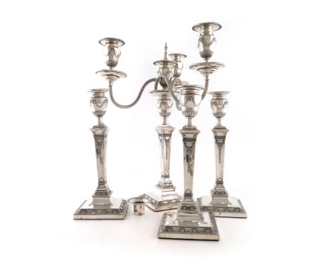 A set of four Victorian silver candlesticks with a matching four-light candelabra branch, by Hawksworth, Eyre and Co., Sheffi