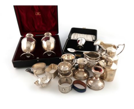 A mixed lot of silver items, various dates and makers, comprising:  a cased pair of sugar casters, by Walker and Hall, Sheffi