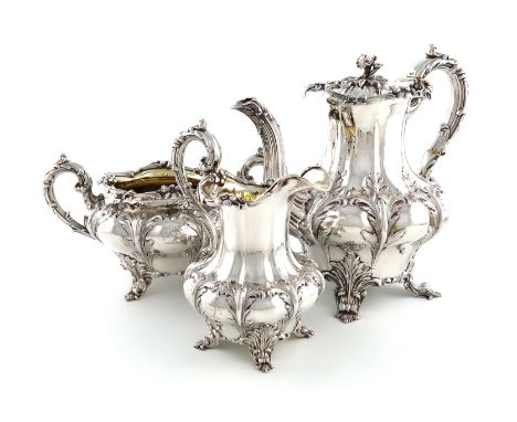 λA William IV silver Coffee pot, cream jug and sugar bowl, by The Barnards, London 1833/34, baluster form, embossed and chase